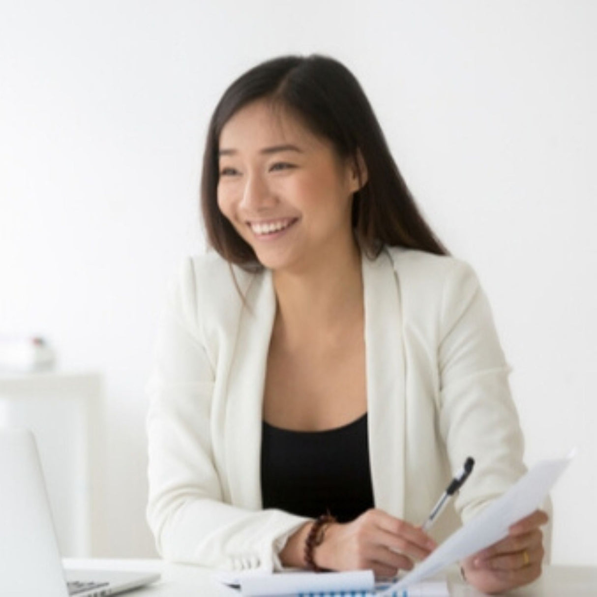 asian employee smiling