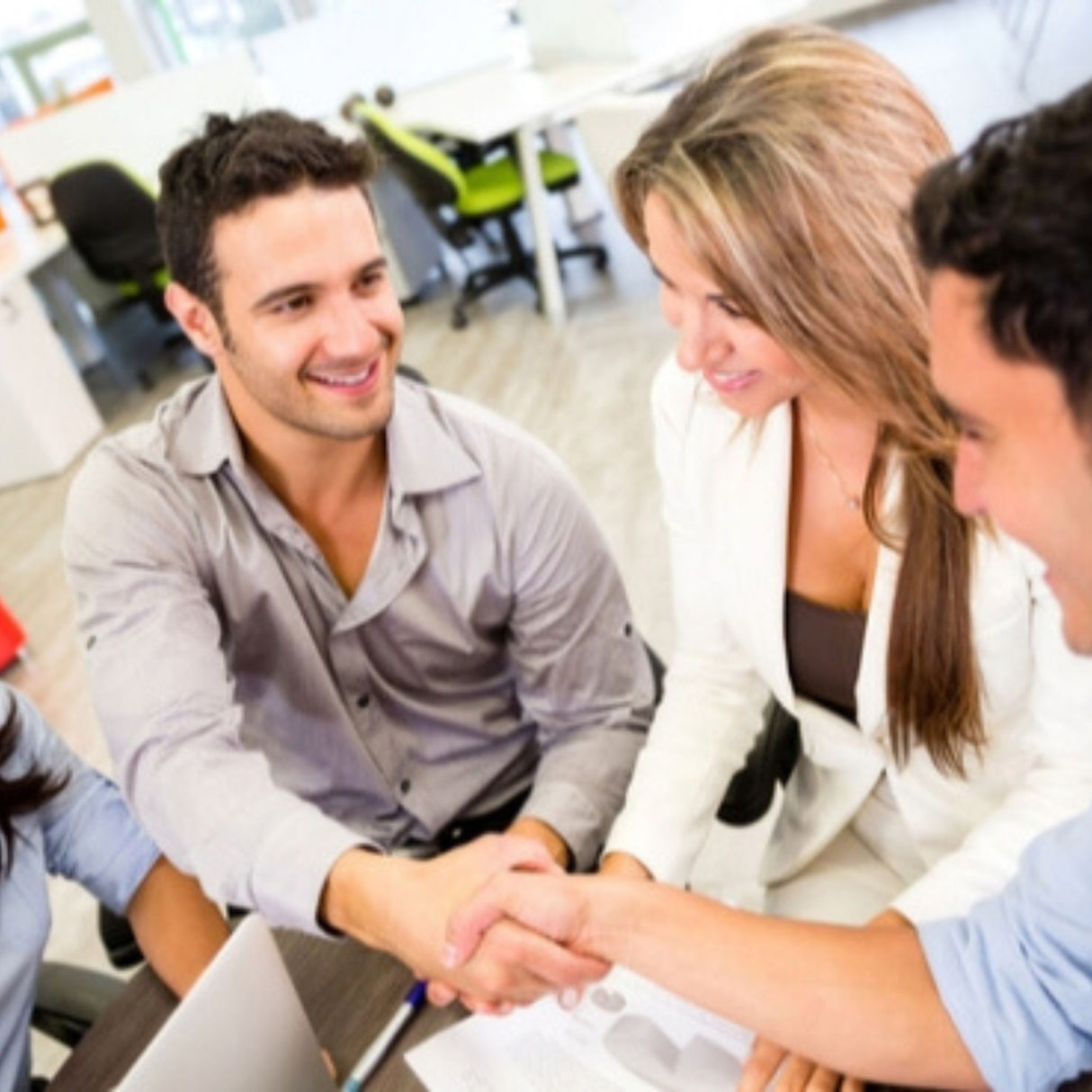 team members shaking hands