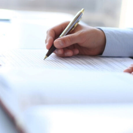 business man writing proposal