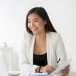 asian employee smiling