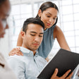 Asian man feels uncomfortable as black female touches his shoulder
