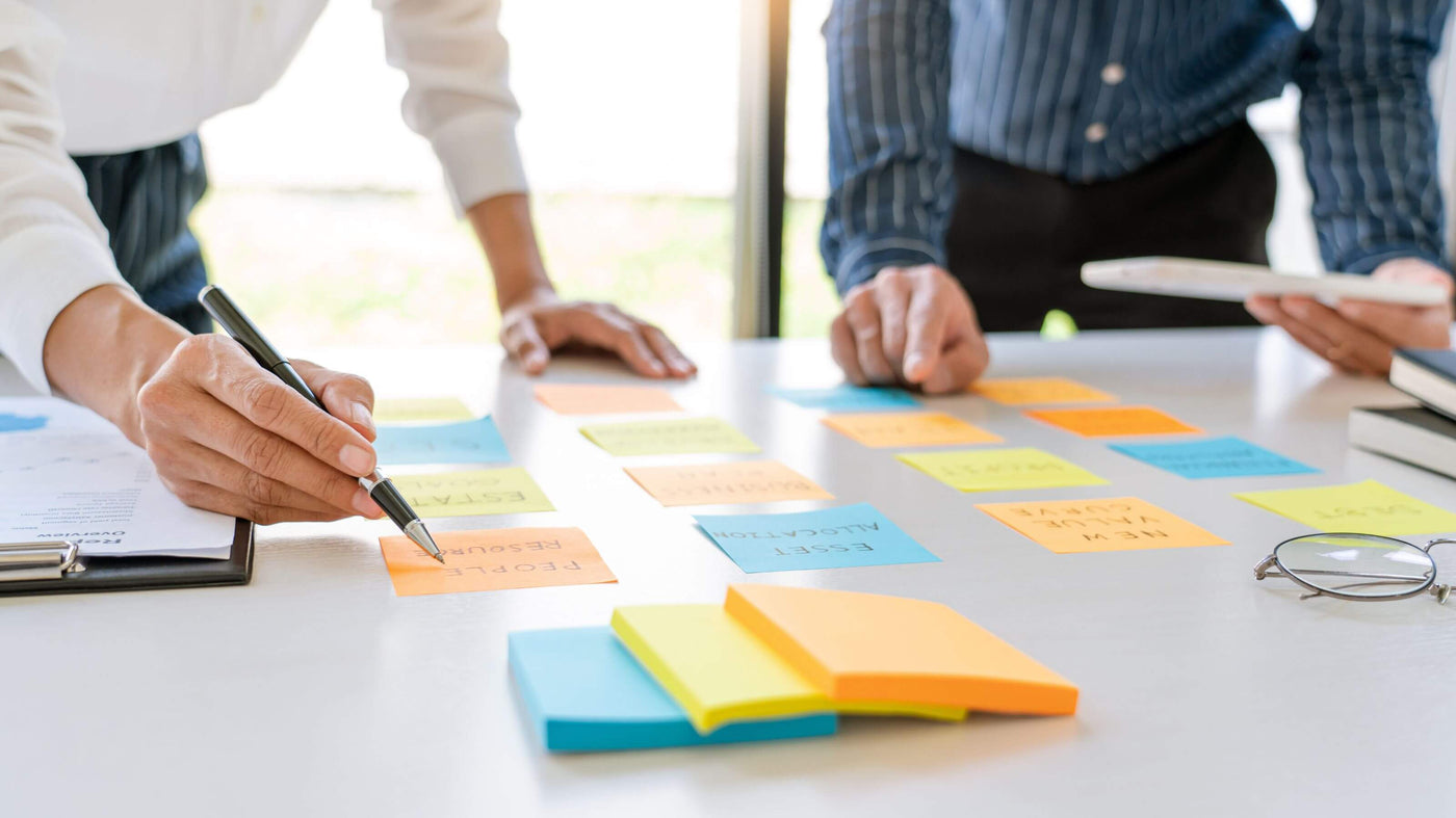 HR managers brainstorming using post-its