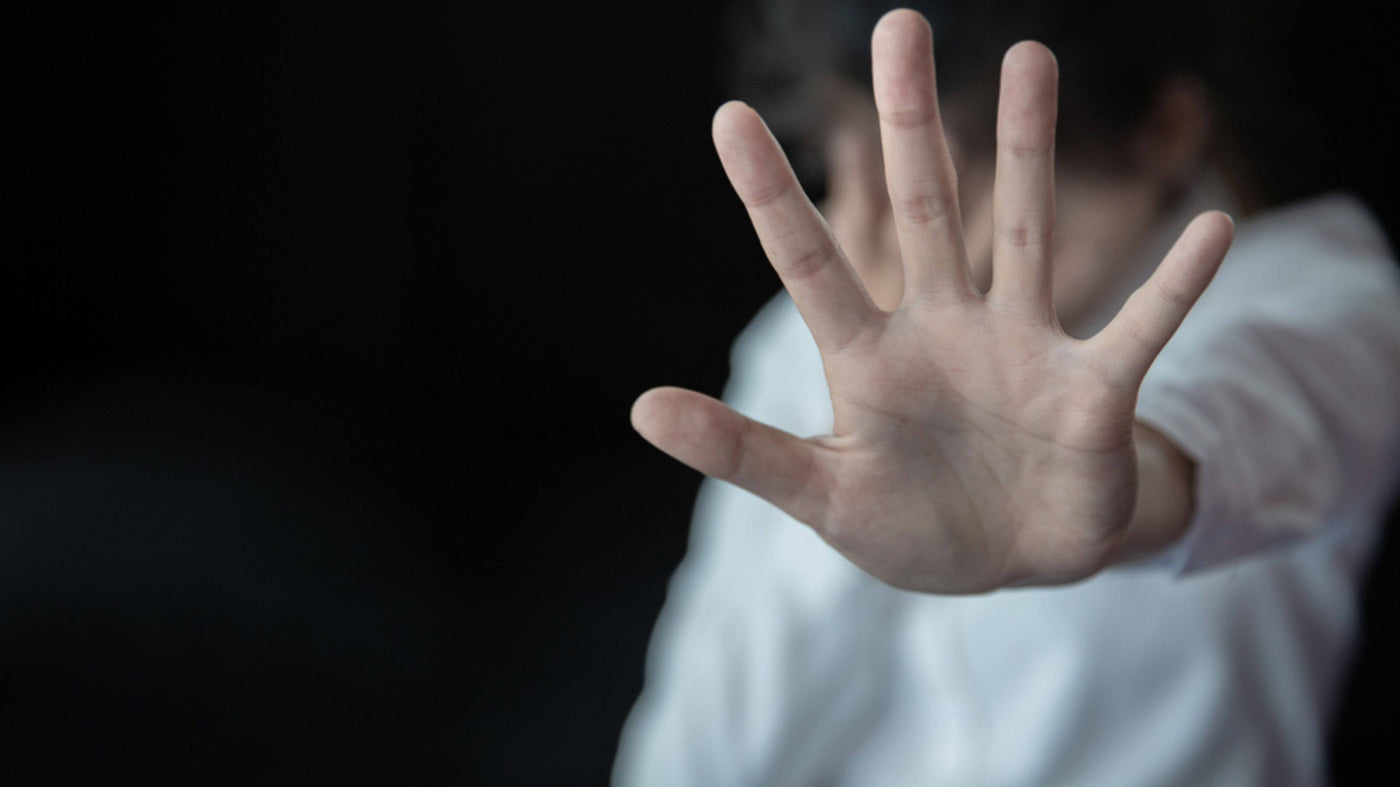 hand symbolizing stop sexual harassment