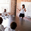 female worker giving a presentation