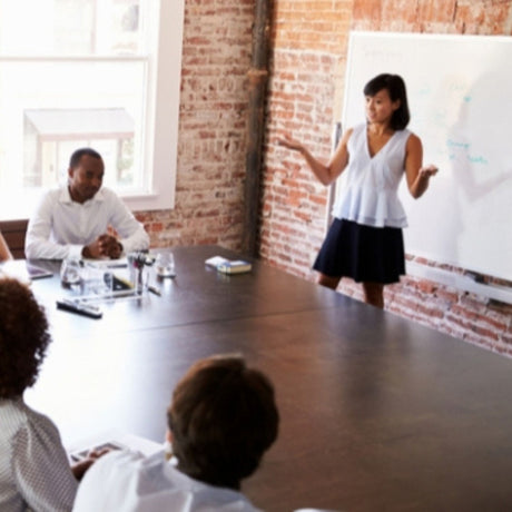 female worker giving a presentation